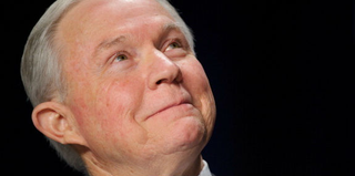 Sen. Jeff Sessions (R-Ala.) smiles at the president during the National Prayer Breakfast. (Mandel Ngan/AFP/Getty Images)